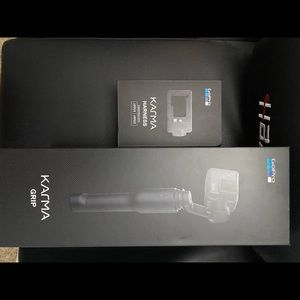 Selling my GoPro 4 silver AND Karma Grip and extra harness!